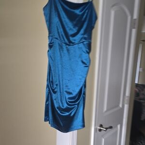 Satin finish, spaghetti straps, ruched bodice, fitted formal gown